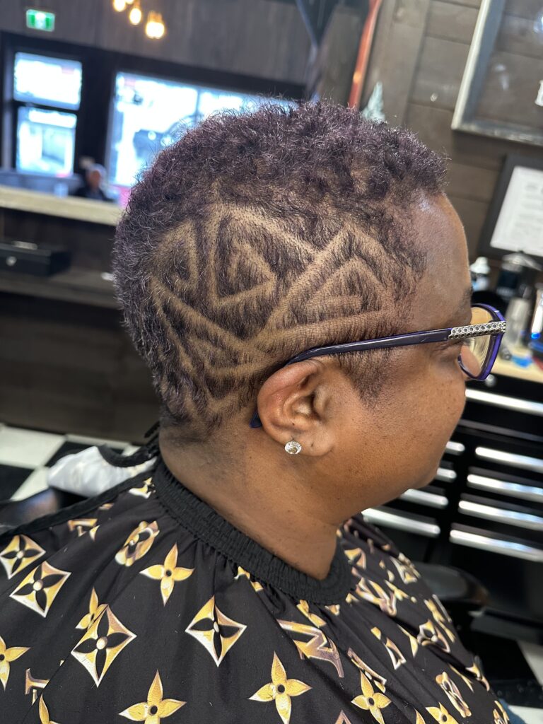 Fade with design performed at The Faithful Barber & Co barbershop. Barber in Aylmer Ontario.