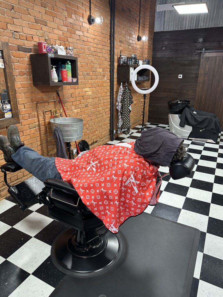 Hot towel head shave performed at The Faithful Barber & Co barbershop. Barber in Aylmer Ontario.